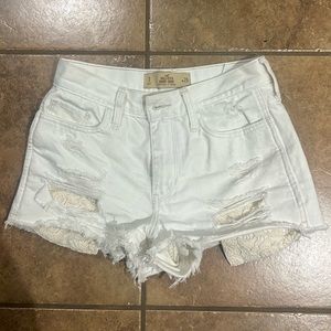 White jean shorts with rips!